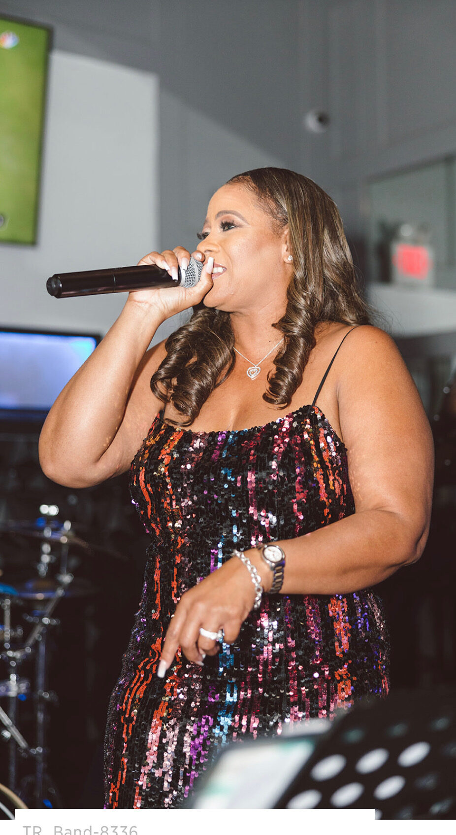 Tiffany Rachal performing in a desert at golden hour